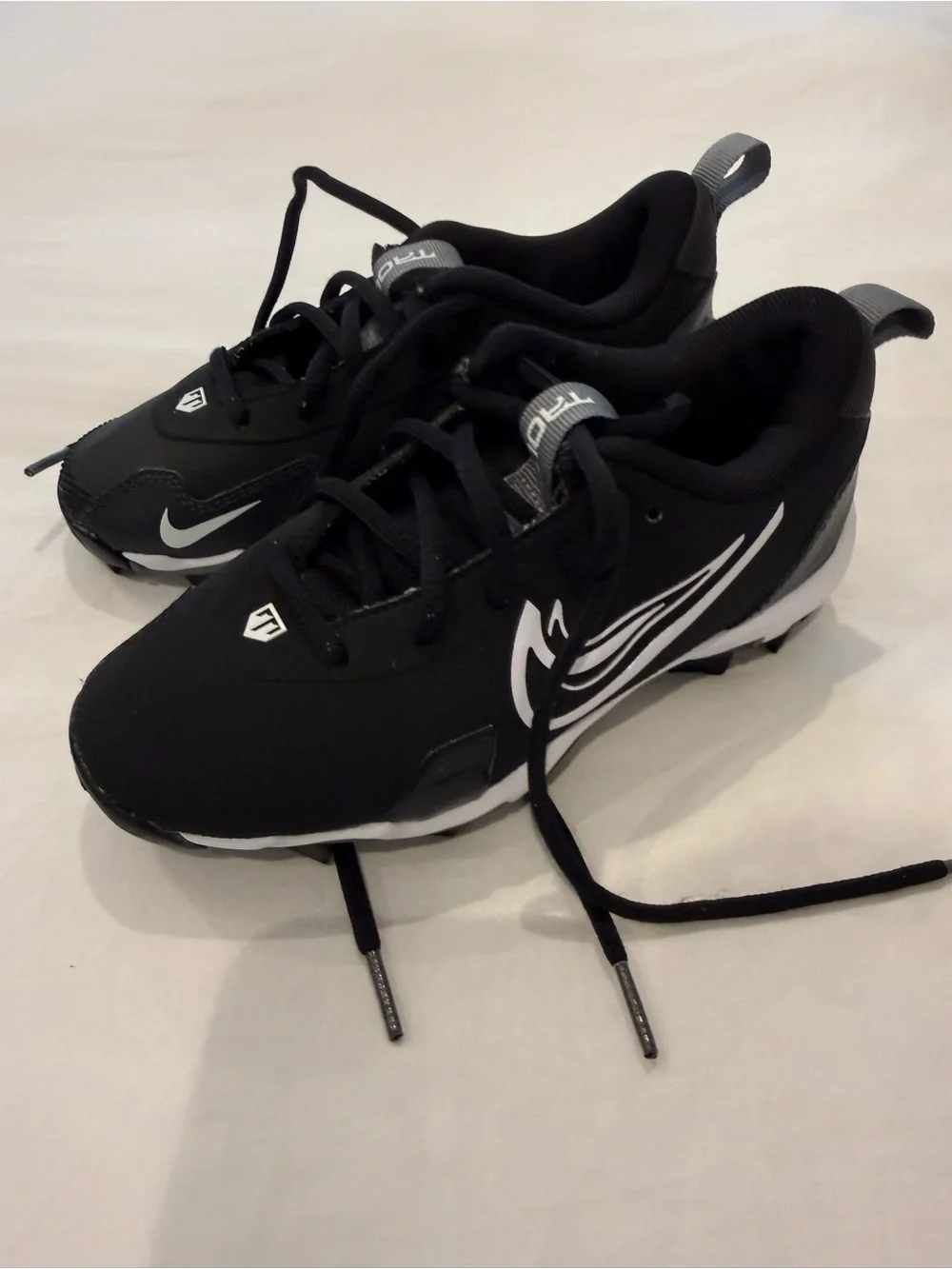 Kids Nike Black Athletic Cleats with White Accents size 1 like new